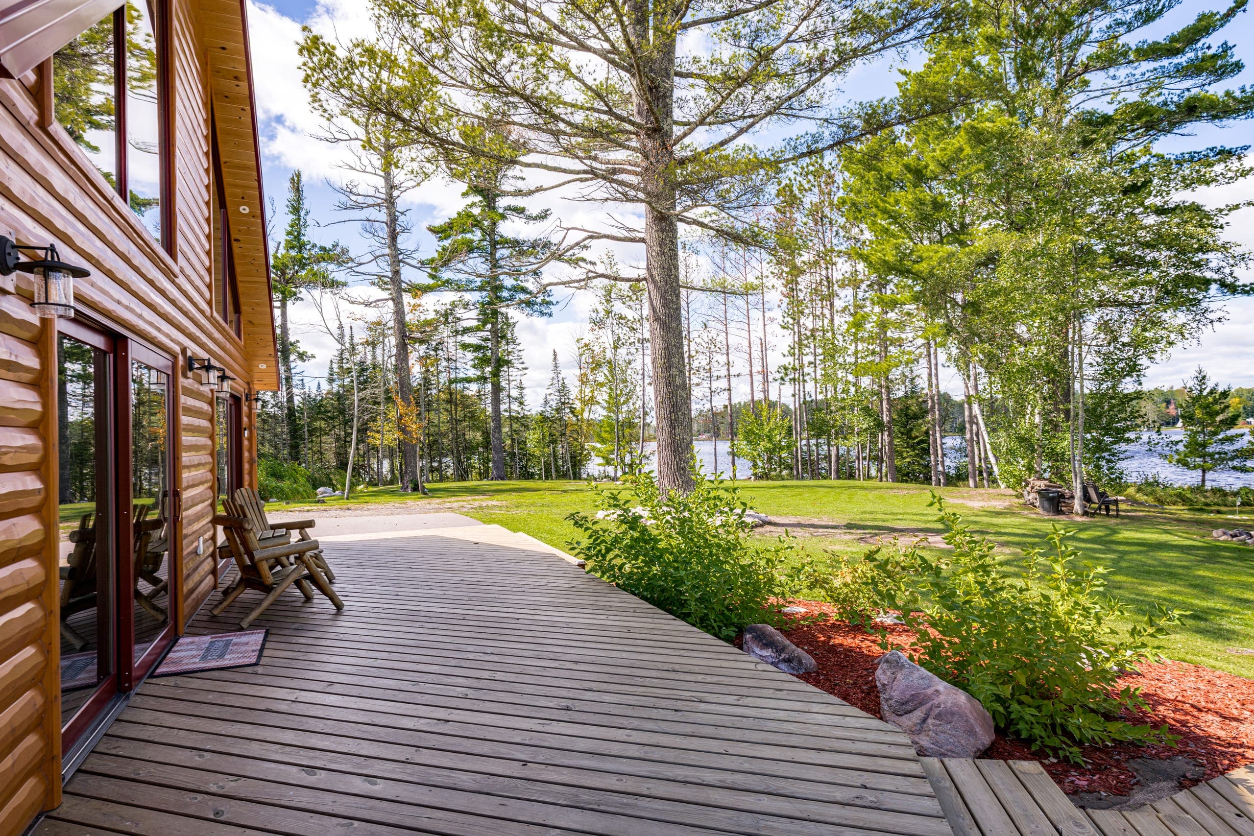 Deck looking through the pines toward the lake