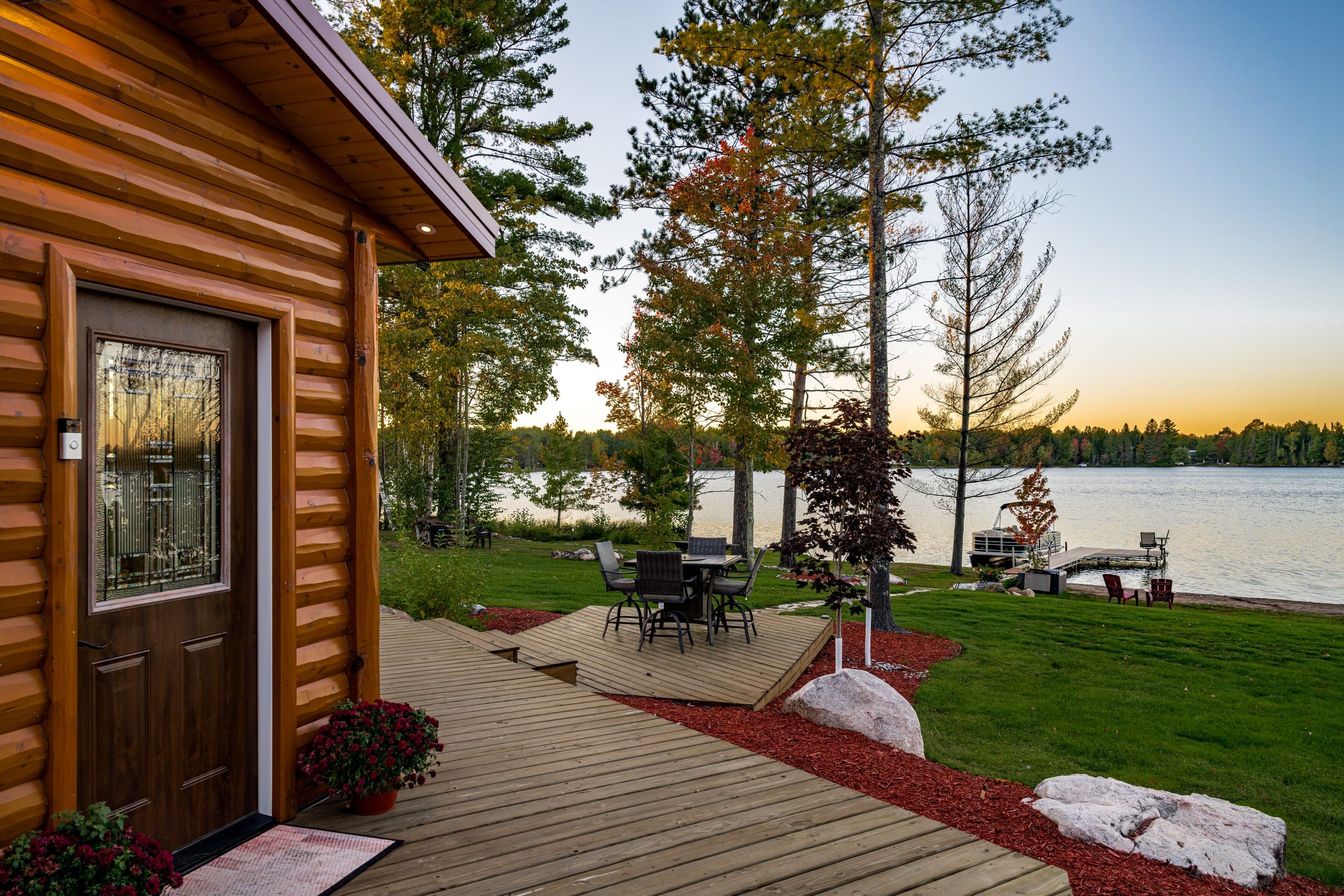 Front door opening onto the deck and the lake
